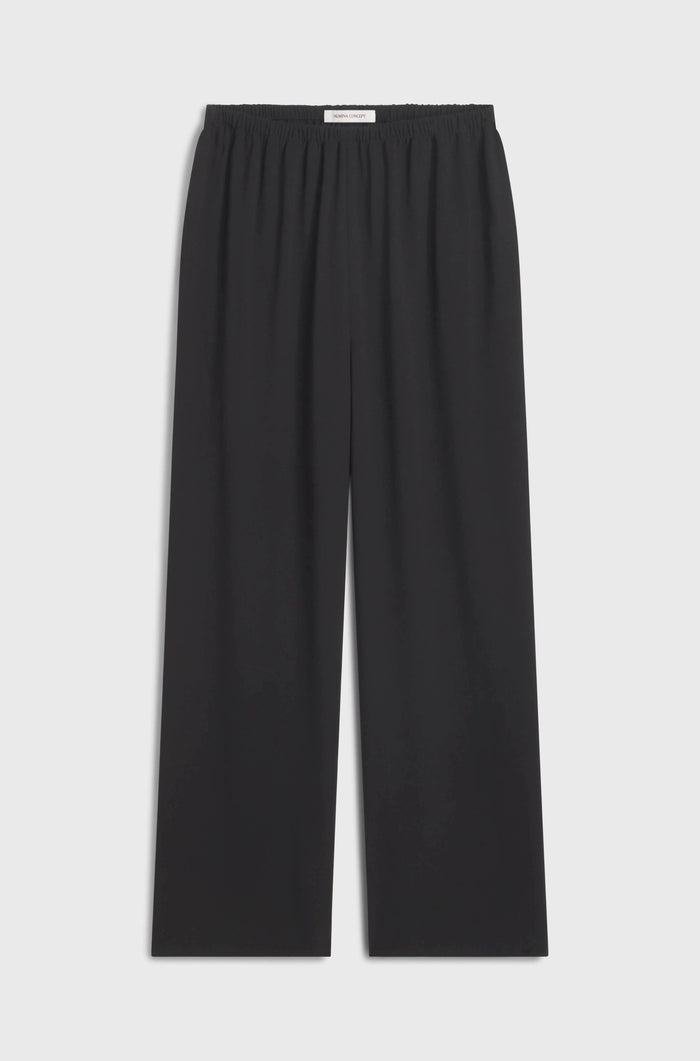 Black pants on a light gray background